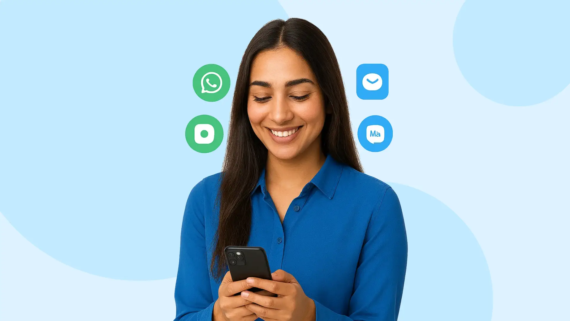 Indian woman in blue shirt smiling at mobile phone with icons for WhatsApp, chat, email, and messaging apps